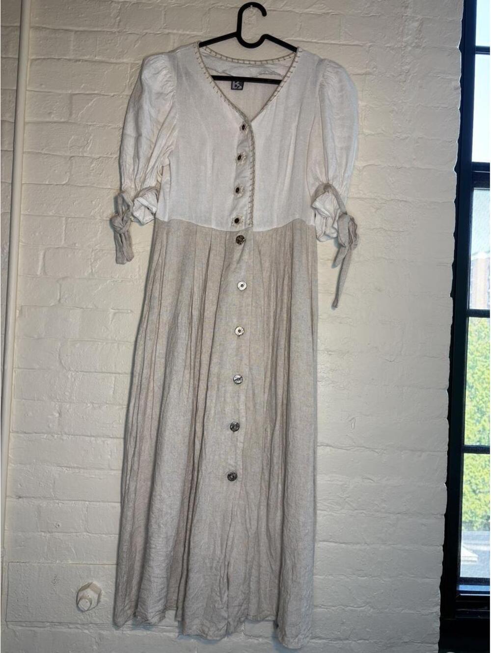 Gorgeous hand made cream linen long dress with button-up front and tie sleeves